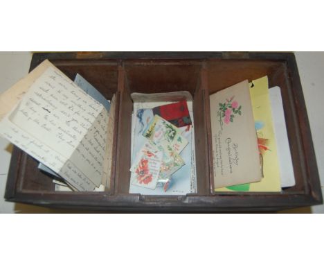 An early 19th century mahogany three division tea caddy and contents to include; letters, photographs and other ephemera 