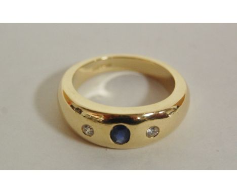 A gentleman's 9ct gold diamond and sapphire set dress ring (boxed), 11.8g