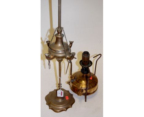 An early 20th century brass four branch oil lamp base together with a Swiss brass burner (2)