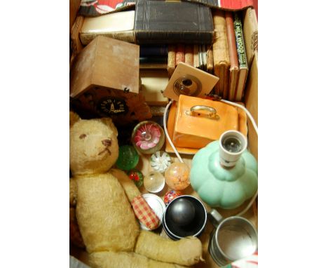 Mixed lot to include; glass paperweights, Sylvac table lamp, cuckoo clock, volumes etc 
