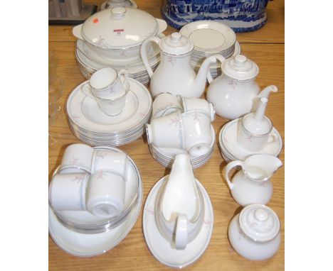 A Royal Doulton part tea dinner service in the Carnation pattern H5084
