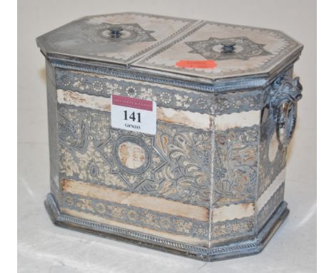 A Victorian silver plated tea caddy with all over engraved decoration