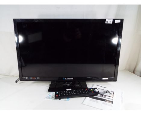 A Blaupunkt LED HD ready flat screen 23 inch television with built-in DVD player, with power lead, remote control and instruc