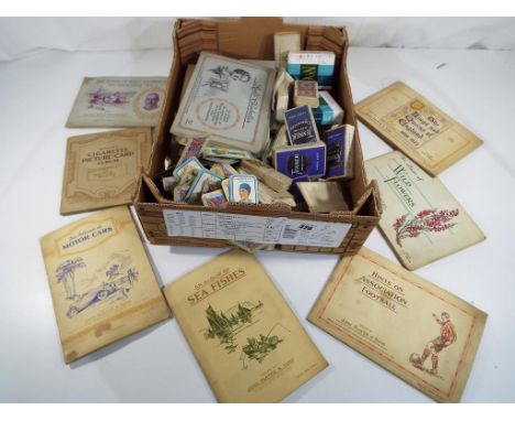 A quantity of Wills vintage picture cards in albums, cigarette cards and similar. Estimate £20 - £40