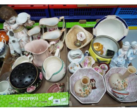 Two boxes containing a good mixed lot of glassware and ceramics to include graduated jugs, a large figurine depicting a lady 