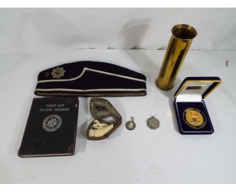 A good lot to include a vintage Boys' Brigade cap and cap badge, a vintage St John's Ambulance Association "First Aid to the 