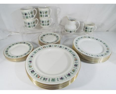 Royal Doulton - a tea / dinner service decorated in the Tapestry pattern, six place setting comprising 25 pieces