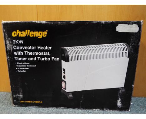 Unused retail stock - a Challenge 2kw convector heater with thermostat timer and turbo fan, sealed