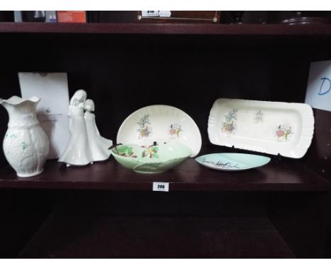 A quantity of good ceramic dishes and figurines to include Beswick, Carltonware, Royal Doulton, Belleek and Royal Worcester. 