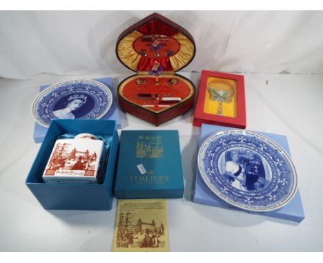 A vintage heart shaped lady's manicure set, a musical box with thorens movement Moulin Rouge Swiss made, a cased magnifying g