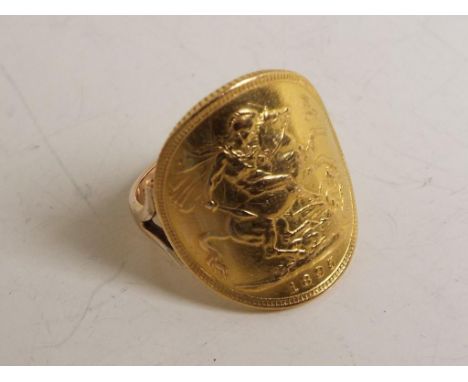 A gold Sovereign, Victoria 1895 formed with a 9 carat gold band to create a ring, total weight  9.68 gm Est £200 - £250