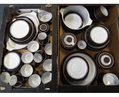 A large quantity of Hornsea ceramic tableware comprising plates, cups, saucers, bowls, lidded dishes and similar. Estimate £2