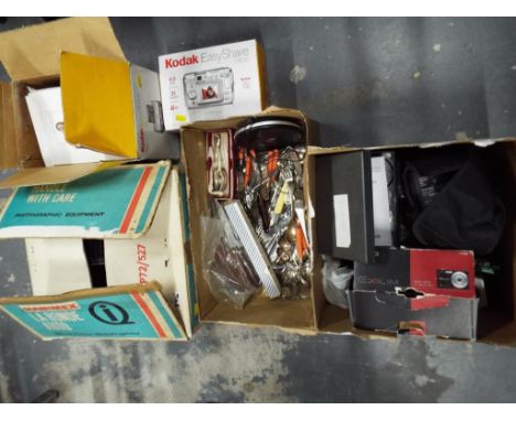 Three boxes containing a mixed lot of plated flatware, a Kodak Easyshare,  a Hanimex La Ronde auto 35 mm colour slide project