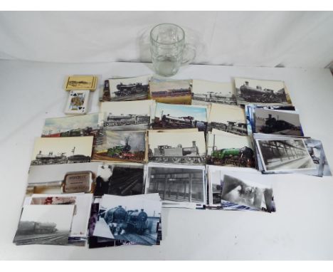 A good mixed lot to include a complete pack of LNER Felixstowe playing cards, excluding jokers, approx 106 railway postcards,