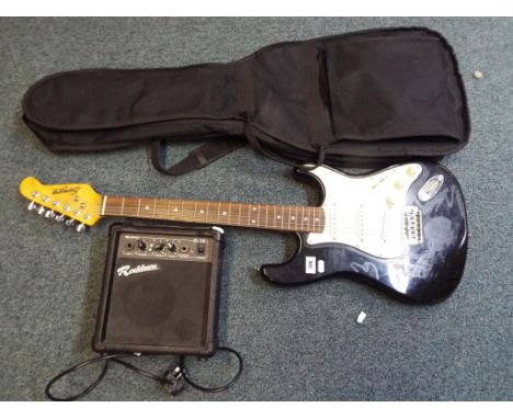 A Sonora electric guitar with case and a Rockburn G-10 amplifier