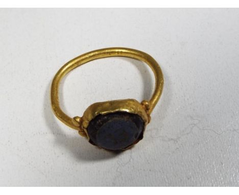 A Roman gold intaglio ring, ca 2nd to 3rd century AD, size H+1/2, approx 1.75 gm (all in) with certificate of authenticity