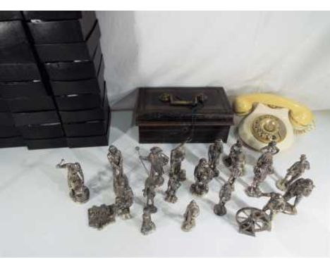 A good lot to include a vintage metal cash box with key, an astral telecom ceramic based telephone and nineteen cast metal fi