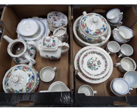 A good lot comprising two boxes of mixed ceramic dinnerware to include  plates, cups, saucers and similar. Estimate £20 - £40