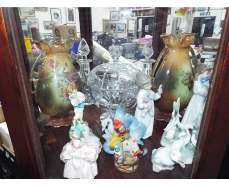 A good mixed lot of ceramics to include Nao, Capodimonte, vases, figurines, crystal decanters and much more