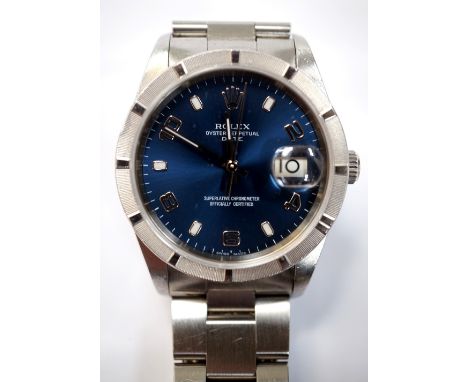 ROLEX OYSTER PERPETUAL DATE WRISTWATCH
the circular blue face with a Cyclops eye at 3, with Arabic and baton hour markers and