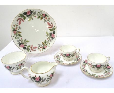 WEDGWOOD 'HATHAWAY ROSE' BONE CHINA TEA SERVICE
comprising six cups, six saucers, six side plates, cake plate, sugar basin an