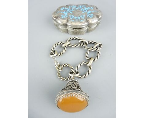 AN UNTESTED WHITE METAL &amp; ENAMEL LIDDED BOX, 8.5cms across and a plated rope twist bracelet with a large seal type pendan