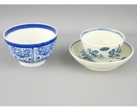 ROYAL WORCESTER - an early blue and white Worcester 'Royal Lily' tea bowl, 5cms height and an early Worcester floral and butt