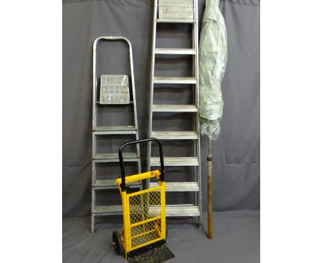 TWO SETS OF ALUMINIUM FOLDING STEP LADDERS, a metal trolley and a garden table parasol