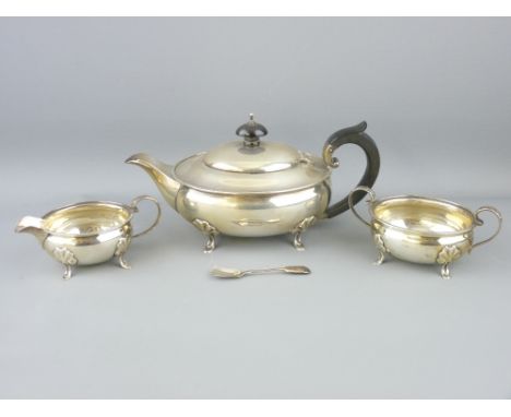THREE PIECE SILVER TEA SERVICE - each of oval plain form with beadwork rims and on four shell and pad supports also a miniatu