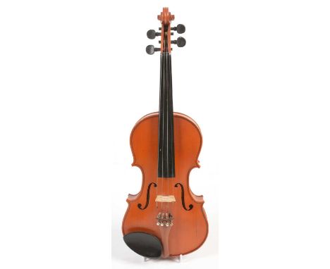A Chinese student Violin, retailed by hand-made music Whitley Bay, light amber finish, length of back 35.5cms, cased.