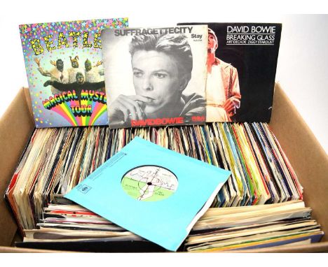 A large collection of 7" 45rpm singles, artists to include: The Beatles; The Rolling Stones; David Bowie; The Clash; Elvis Co