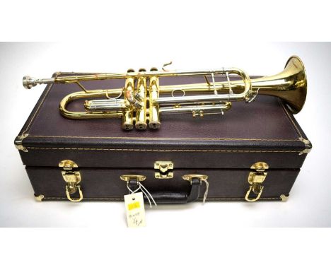 A Bach Stradivarius model 43 lightweight Trumpet serial number L 206682, lacquered brass and silvered, stamped on the bell 'E