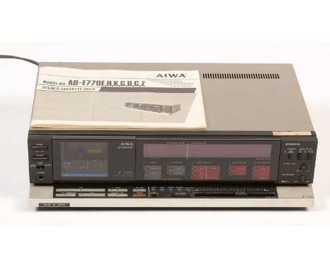 An Aiwa F770 stereo cassette deck, with original instruction manual.