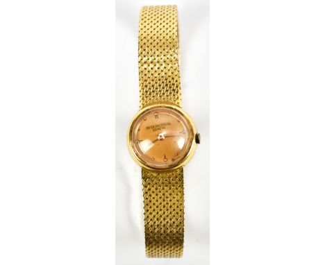PATEK PHILIPPE; a lady's vintage 18ct yellow gold wristwatch, with circular dial and eighteen jewel movement no.865780 on int