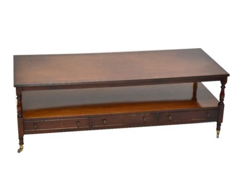 A reproduction mahogany rectangular coffee table with undertier shelf, length 138cm.