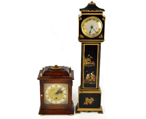 ELLIOTT; a 20th century mantel clock in the form of a longcase clock, the circular dial set with Roman numerals inset within 