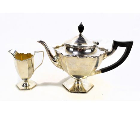 WILLIAM HUTTON &amp; SONS LTD; a George V hallmarked silver teapot, inscribed to base 'To R.W. Evans as a small mark of appre