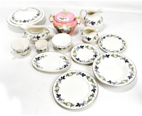 ROYAL DOULTON; a 'Burgundy' TC1001 dinner service, comprising six large plates, two circular tureens and covers, eight side p