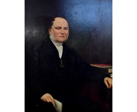 19TH CENTURY ENGLISH SCHOOL; oil on canvas, portrait study of a seated gentleman holding a book in his right hand, unsigned, 