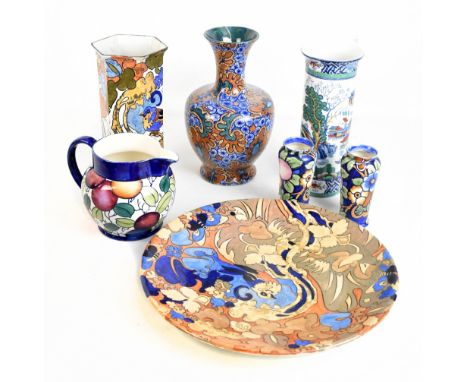 FREDERICK AND CHARLOTTE RHEAD FOR BURSLEY WARE; a group comprising 'Benares' baluster vase, height 27cm, jug and small pair o