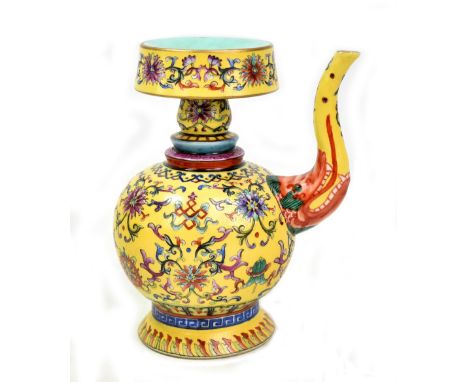 A Chinese Tibetan style ewer (Penba Hu) decorated with the eight Buddhist symbols (Bajixiang) and with spout protruding from 
