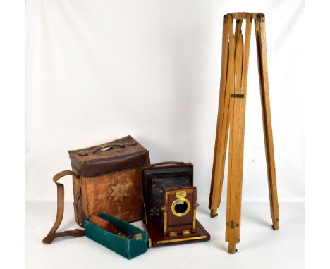 ROSS &amp; CO; a cased 19th century plate camera with a 'Jena' J.J Atkinson lens and an associated wooden tripod (2).Addition