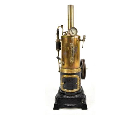 A stationary upright steam engine raised on square section base, height 37cm.