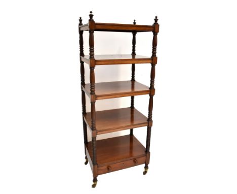 A William IV mahogany five-tier whatnot with baluster and bobbin-turned uprights, frieze drawer and turned legs, 137 x 51.5 x