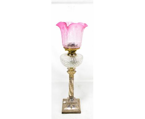 A Victorian electroplated Corinthian column oil lamp with floral swag decoration, height 78cm.Additional InformationSome scuf
