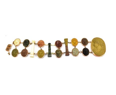 A Victorian lava cameo bracelet, set with large oval profile portrait plaque to one end, a series of twelve variously coloure