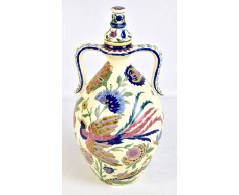 ZSOLNAY PECS; a twin handled lidded vessel decorated with birds amongst flowers, height 41cm.Additional InformationCover has 