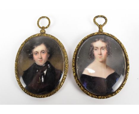 A pair of 19th century portrait miniatures depicting a gentleman and a lady (latter af), both unsigned, set in floral motif g