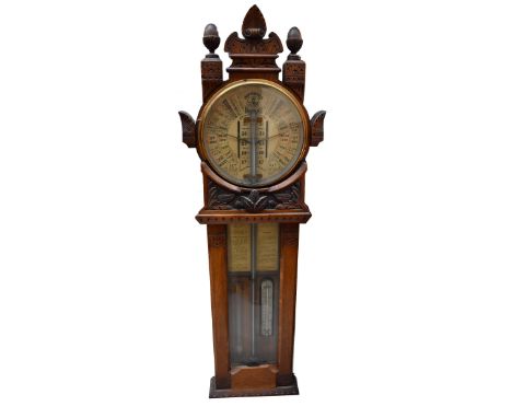 An early 20th century carved oak cased 'Improved Barometer', height 116cm.