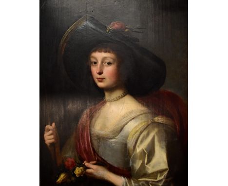 CIRCLE OF GERRIT VAN HONTHORST; oil on panel, portrait of a woman wearing a hat and holding flowers, bearing signature and in